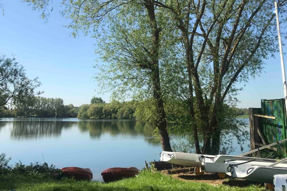 Bray Lake Watersports Bray Berkshire willow tree lined lake paddle boarding sailing wind surfing and more
