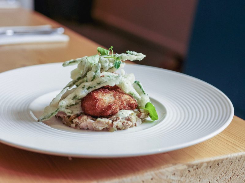 The tilbury plate of food on table