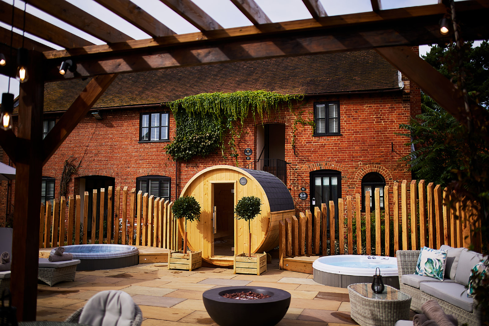 spa garden with sauna and hot tubs at Seckford hall in suffolk