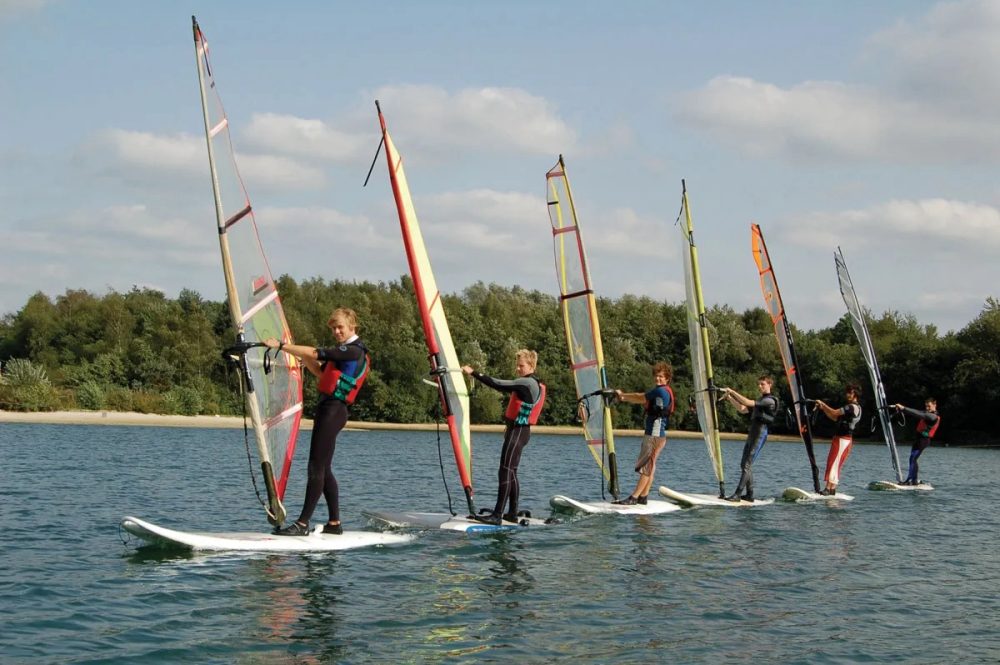 Windsurfing lesson with Aqua Sport Company at Mercers Country Park near Redhill, Surrey.