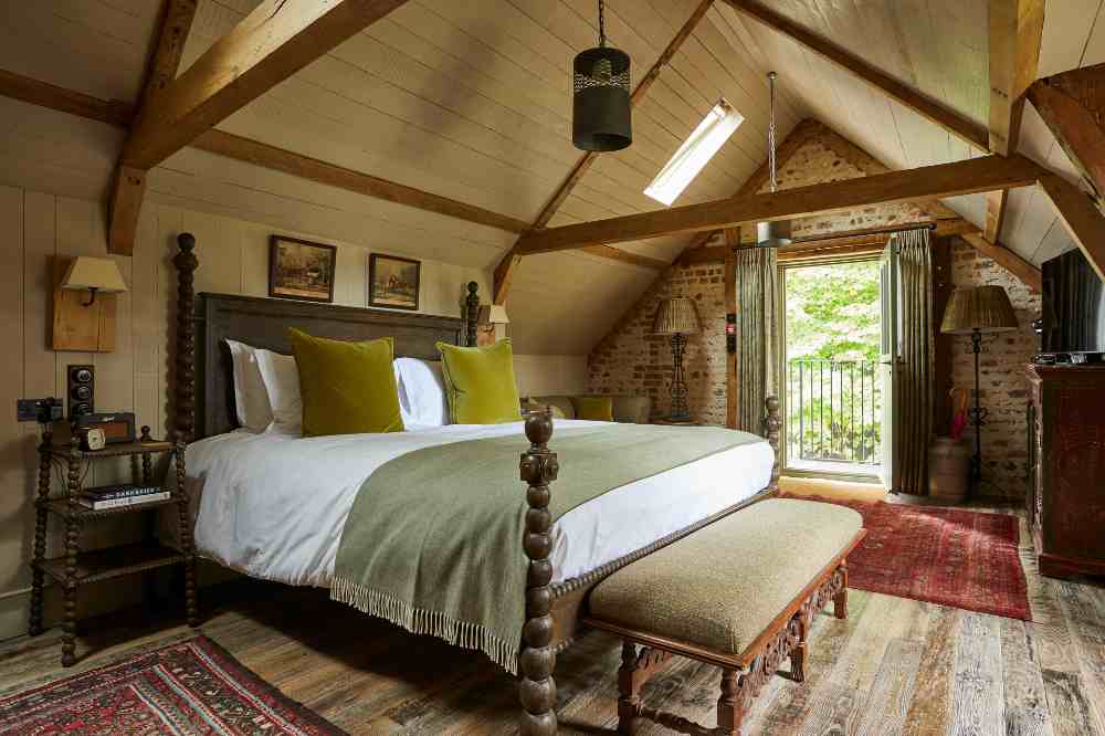 THE PIG Hotel bedroom with beams