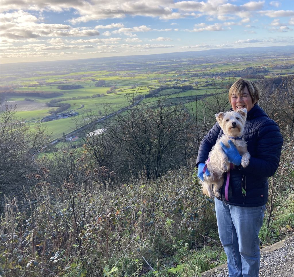 Bridget McGrouther editor muddy yorkshire with dog in the countryside 